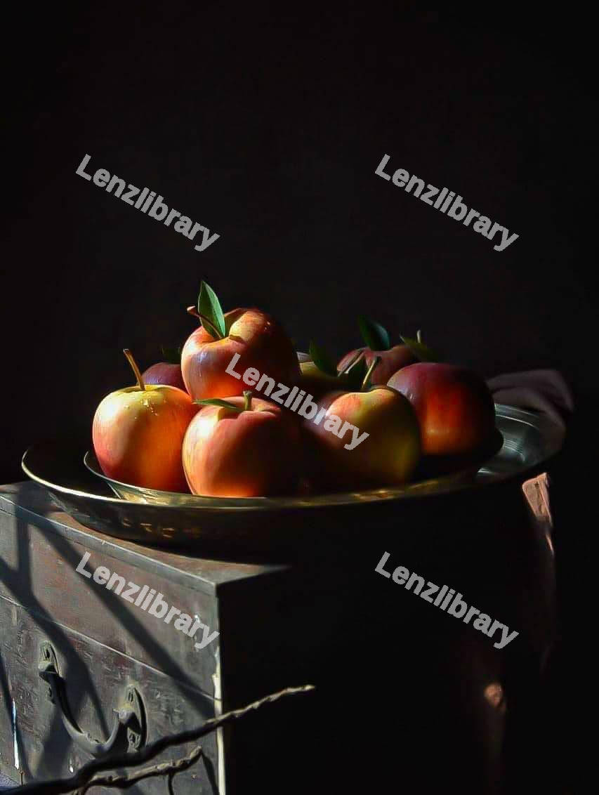 Red apple in a brass bowl